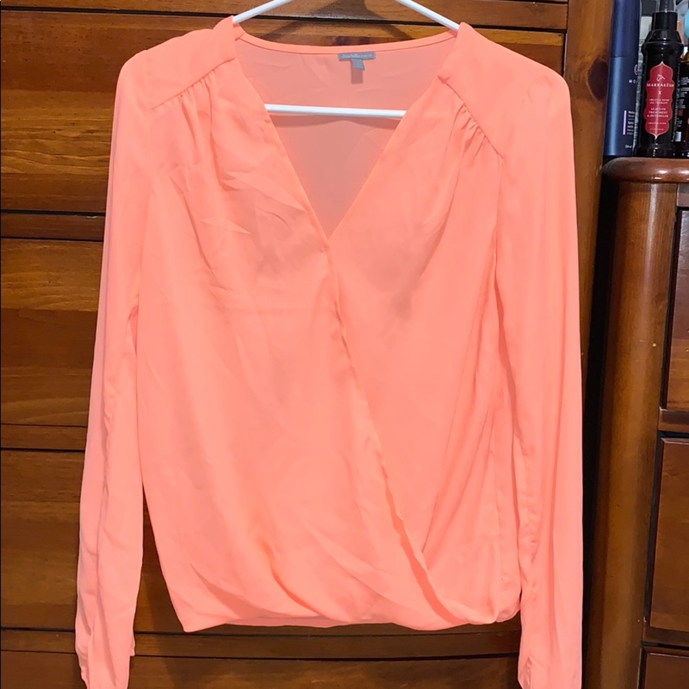 Neon salmon/coral blouse.